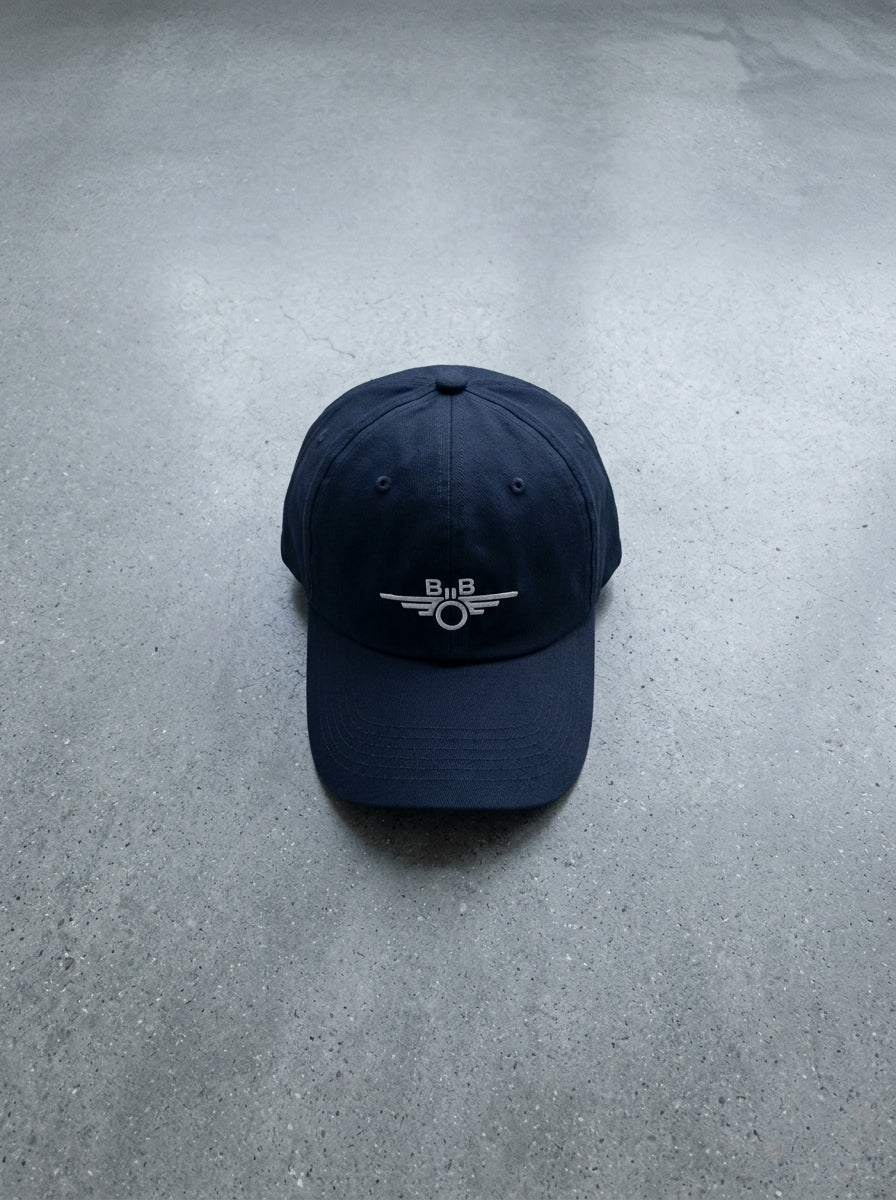 Signature Baseball Cap — Modern Traveler Flat Lay | Generated by Modelize