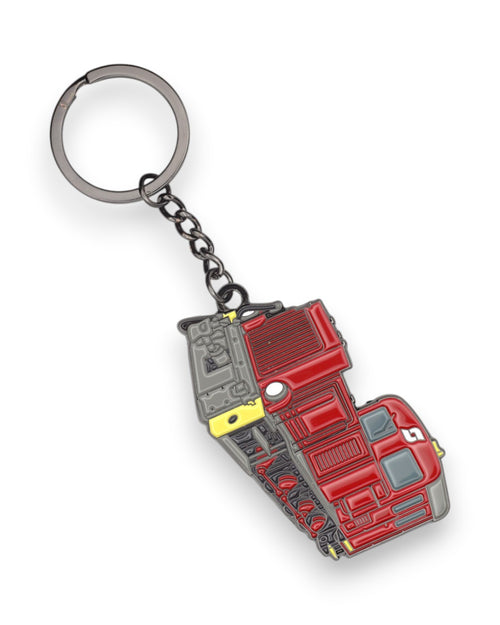 Trainimals 2092 enamel keychain featuring a red and grey detailed model of a narrow-gauge steam locomotive with a silver keyring.