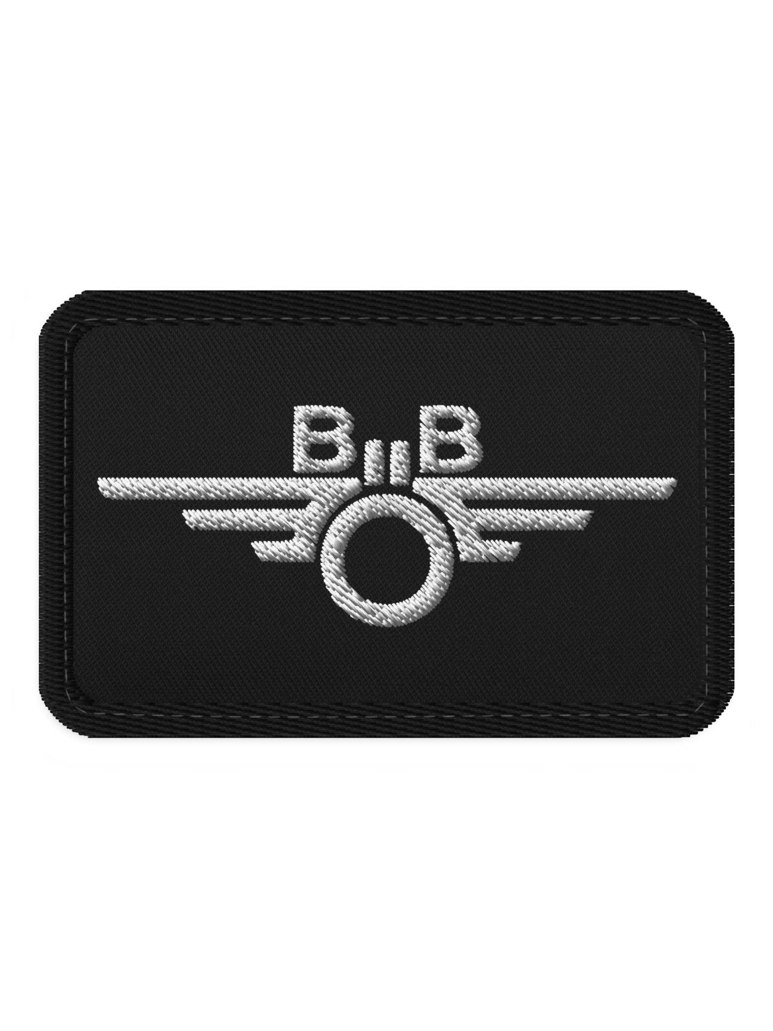 Trainimals Flügelrad Klett-Patch in Schwarz mit weißer Stickerei aus Twill-Gewebe für Rucksäcke und Jacken