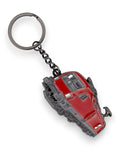 Trainimals red Taurus locomotive enamel keychain with detailed metalwork and sturdy chain.