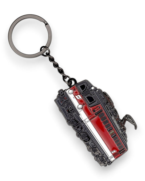 Trainimals "Glubschi" enamel keychain featuring a red and white Austrian Baureihe 1142 locomotive design with a metal ring and chain.